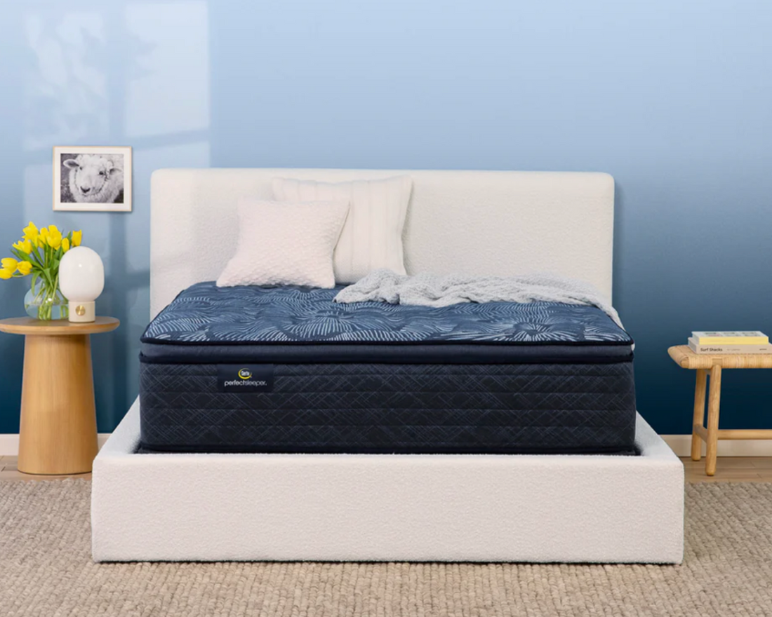 Head-on view of a bedroom with the Serta Innerspring Mattress.