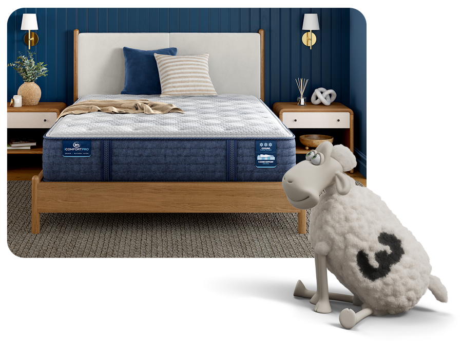 Serta mattress on a bedroom in a serene blue bedroom. A Serta sheep overlays this image smiling.