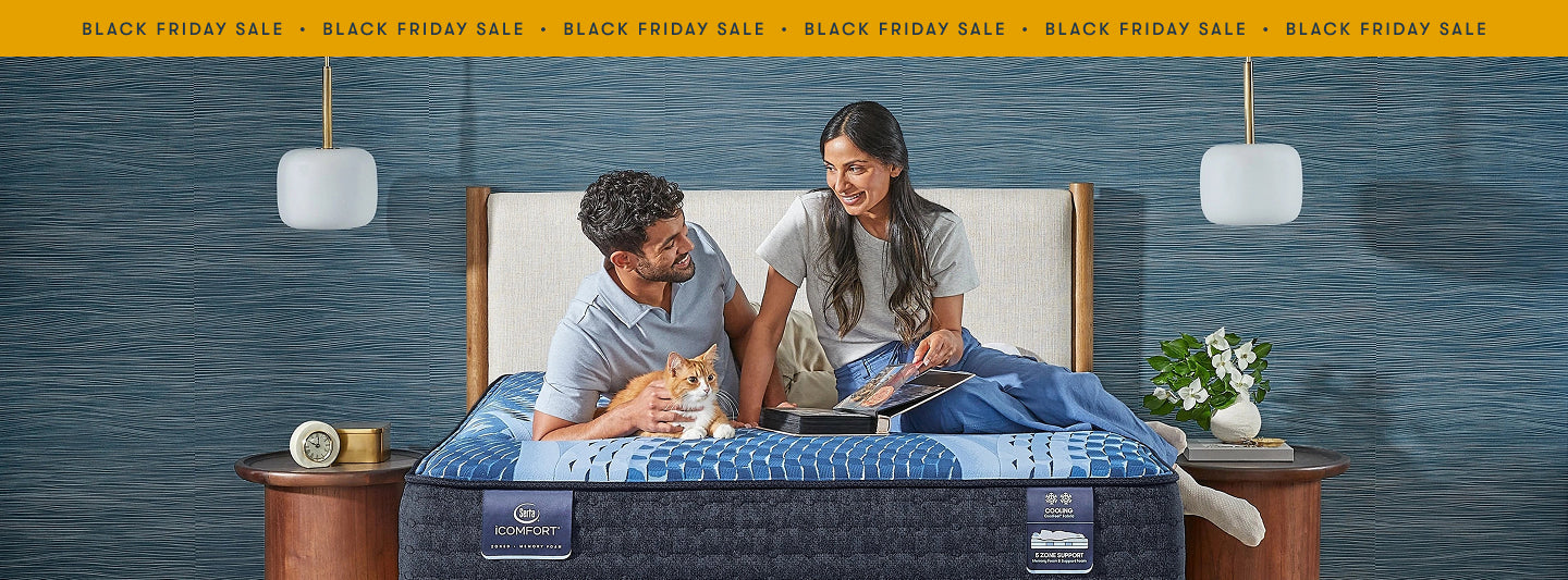 couple relaxing on a serta mattress